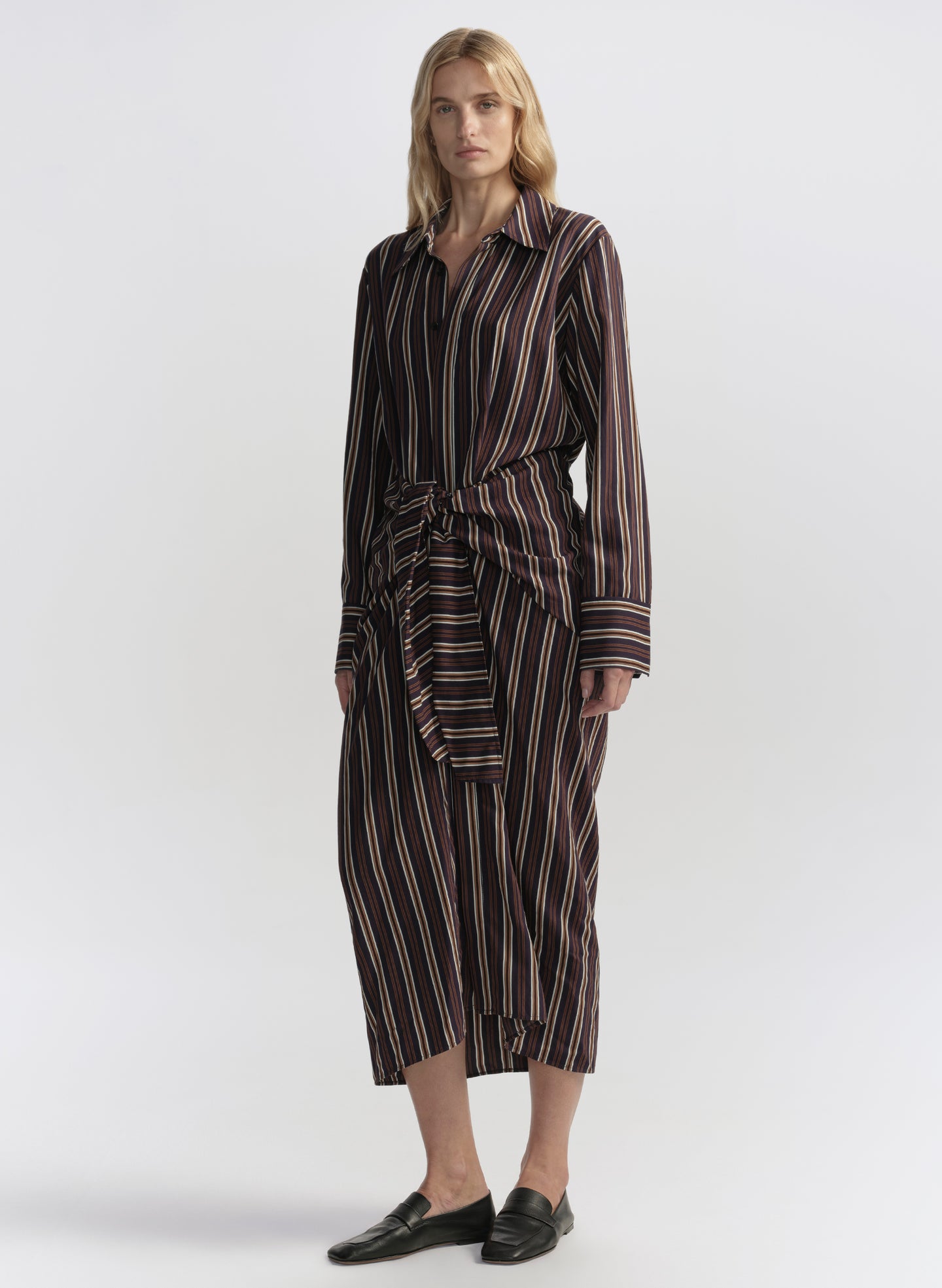 woman wearing striped midi dress