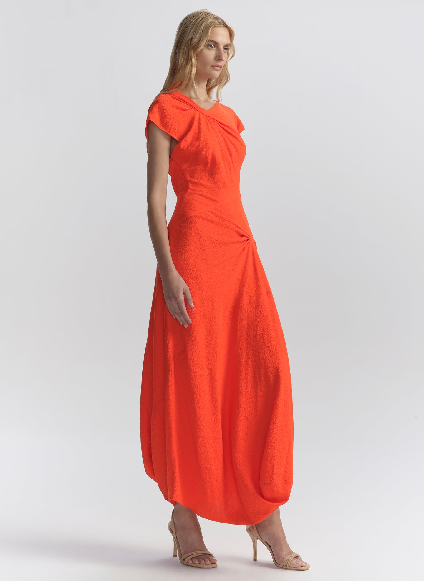 woman wearing orange dress