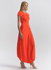 woman wearing orange dress