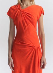 woman wearing orange dress