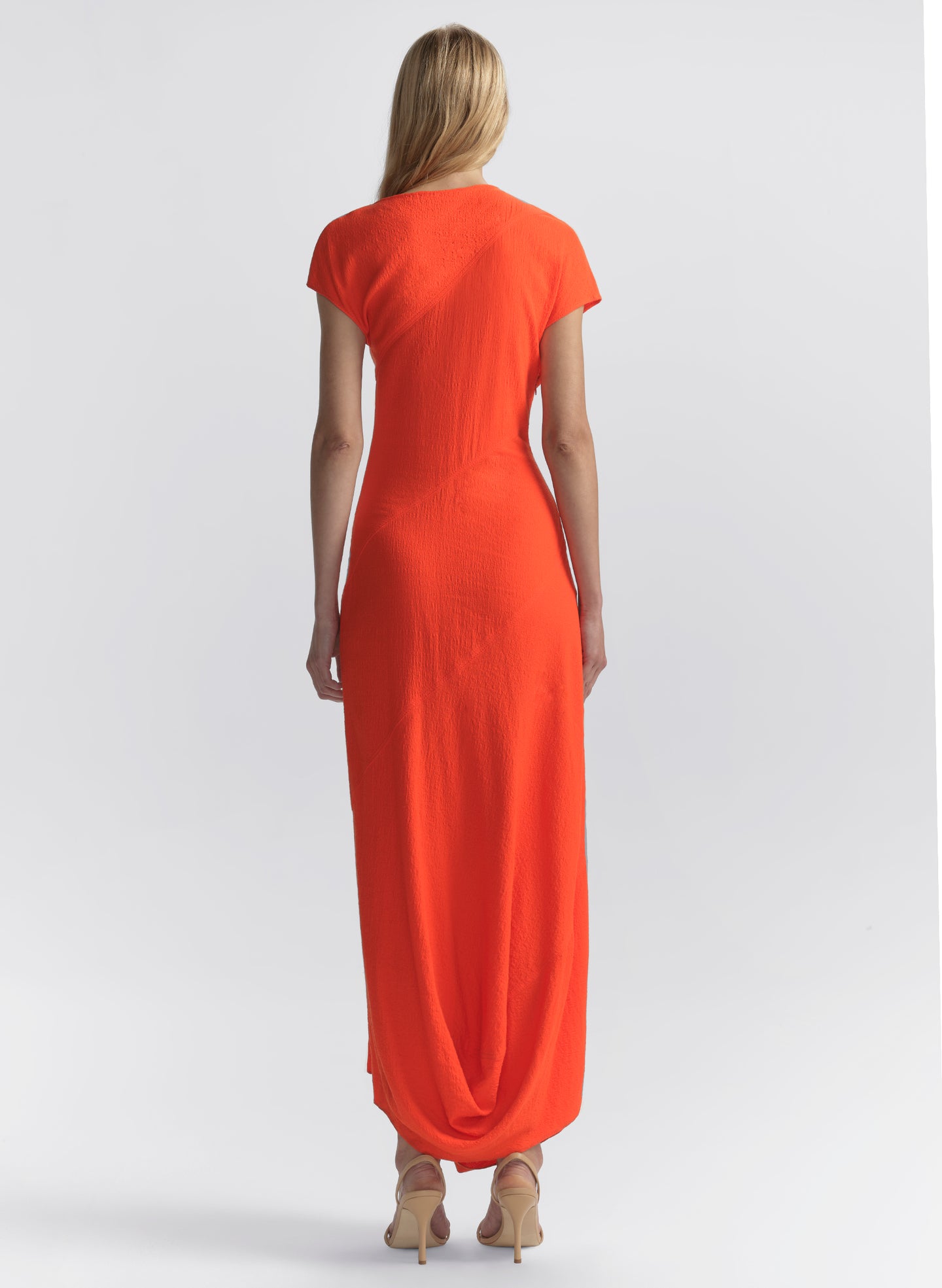 woman wearing orange dress