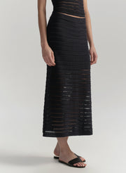 Woman wearing a blue skirt