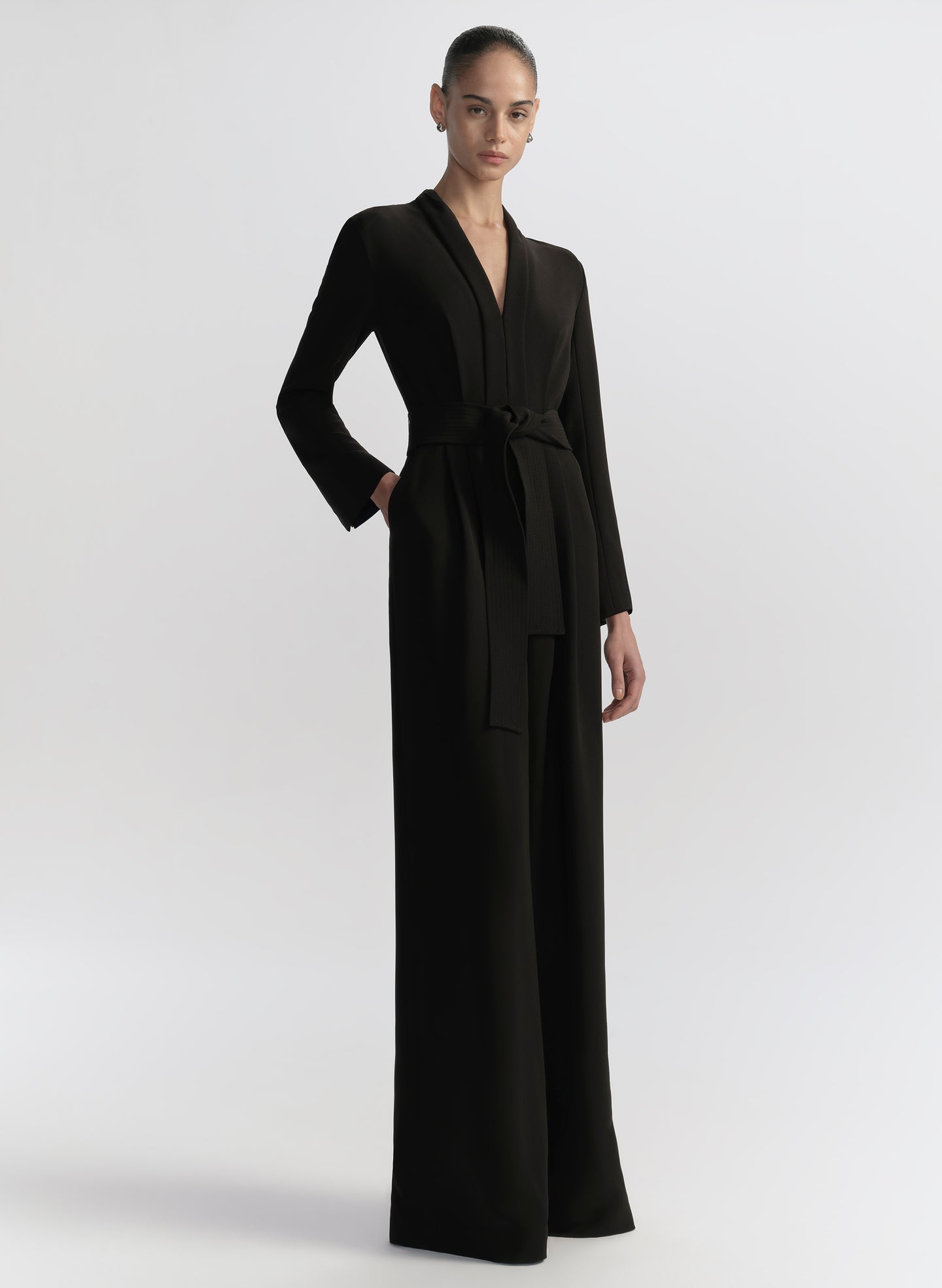 woman wearing black jumpsuit