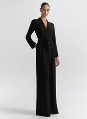 woman wearing black jumpsuit