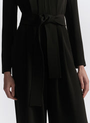 woman wearing black jumpsuit