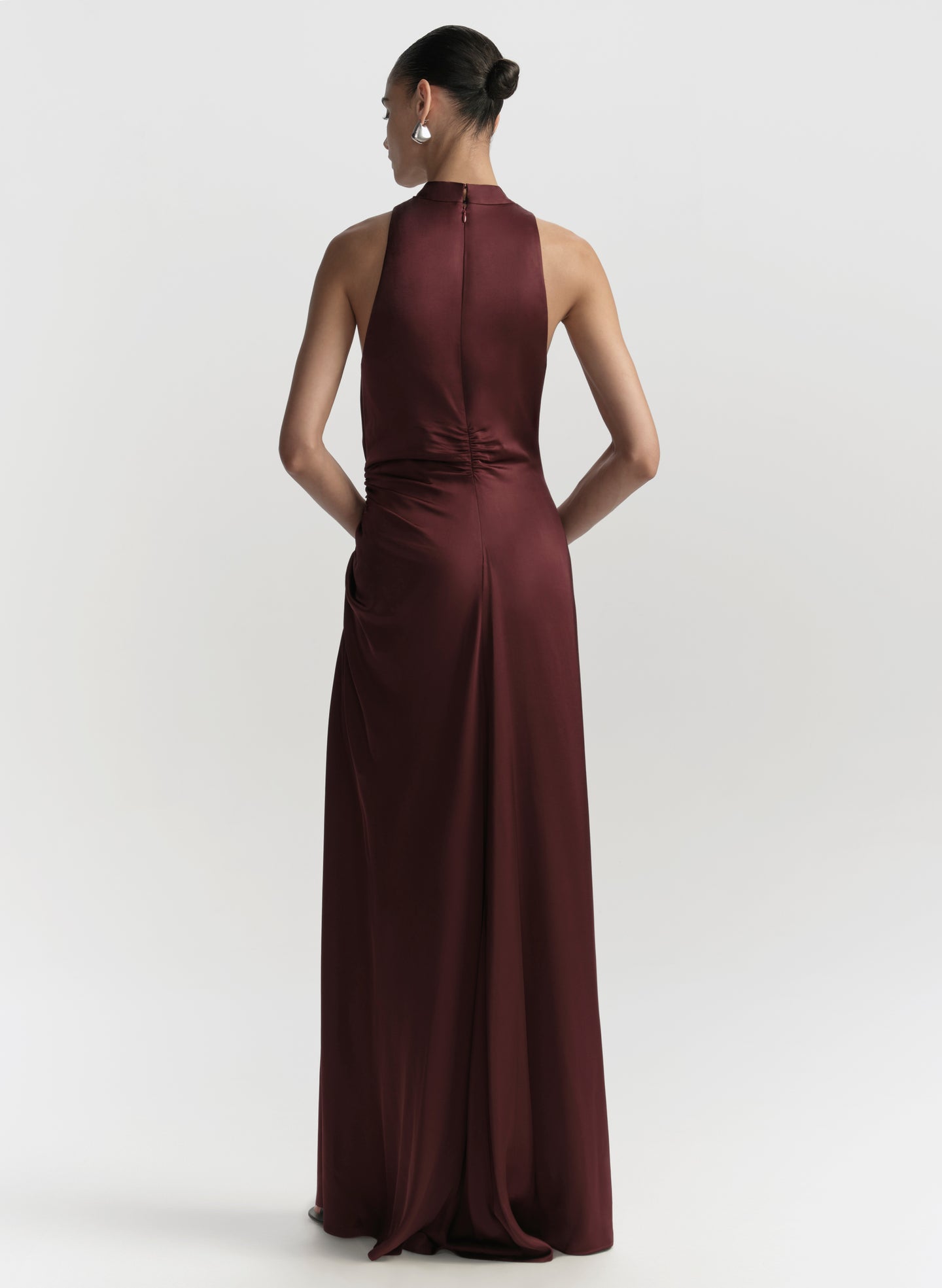 Burgundy evening gown on a white background