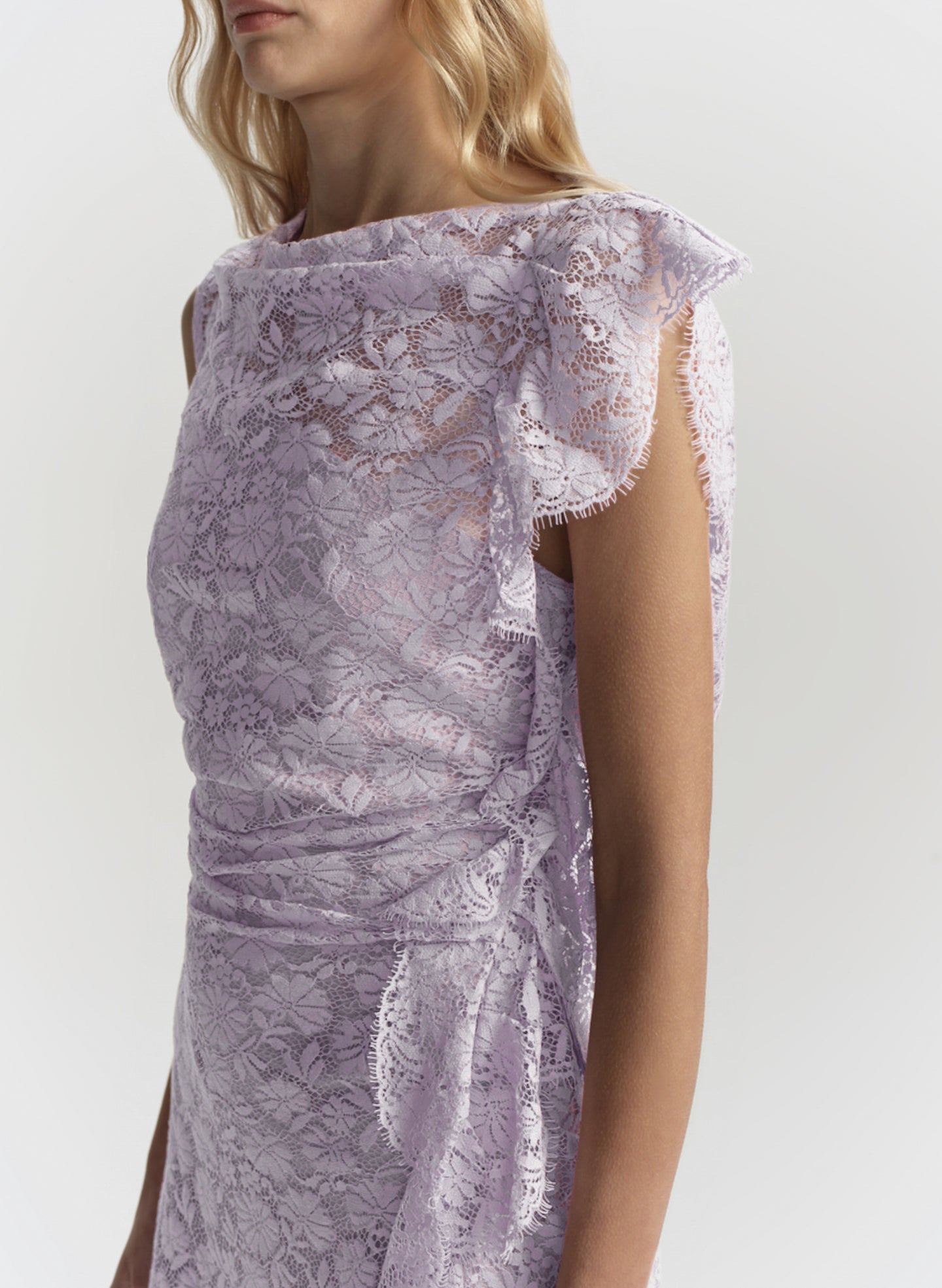 Lavender lace dress with a white background