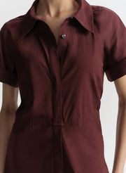 woman wearing purple dress