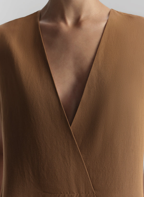 Woman wearing brown mini dress