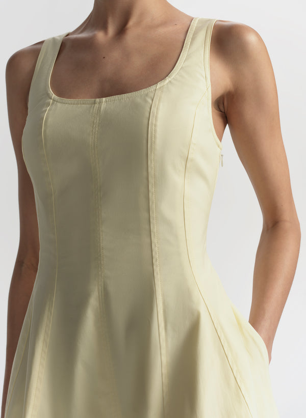 Light green sleeveless dress on a plain background