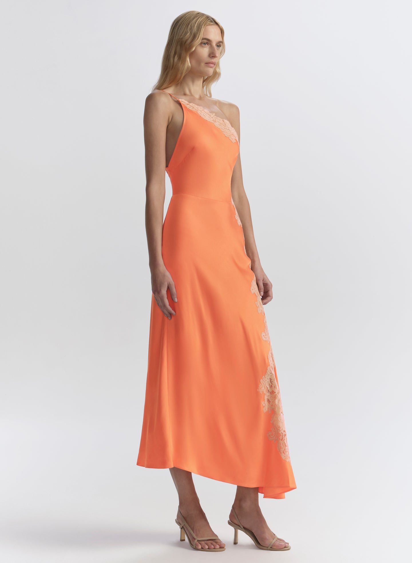 woman wearing orange midi dress