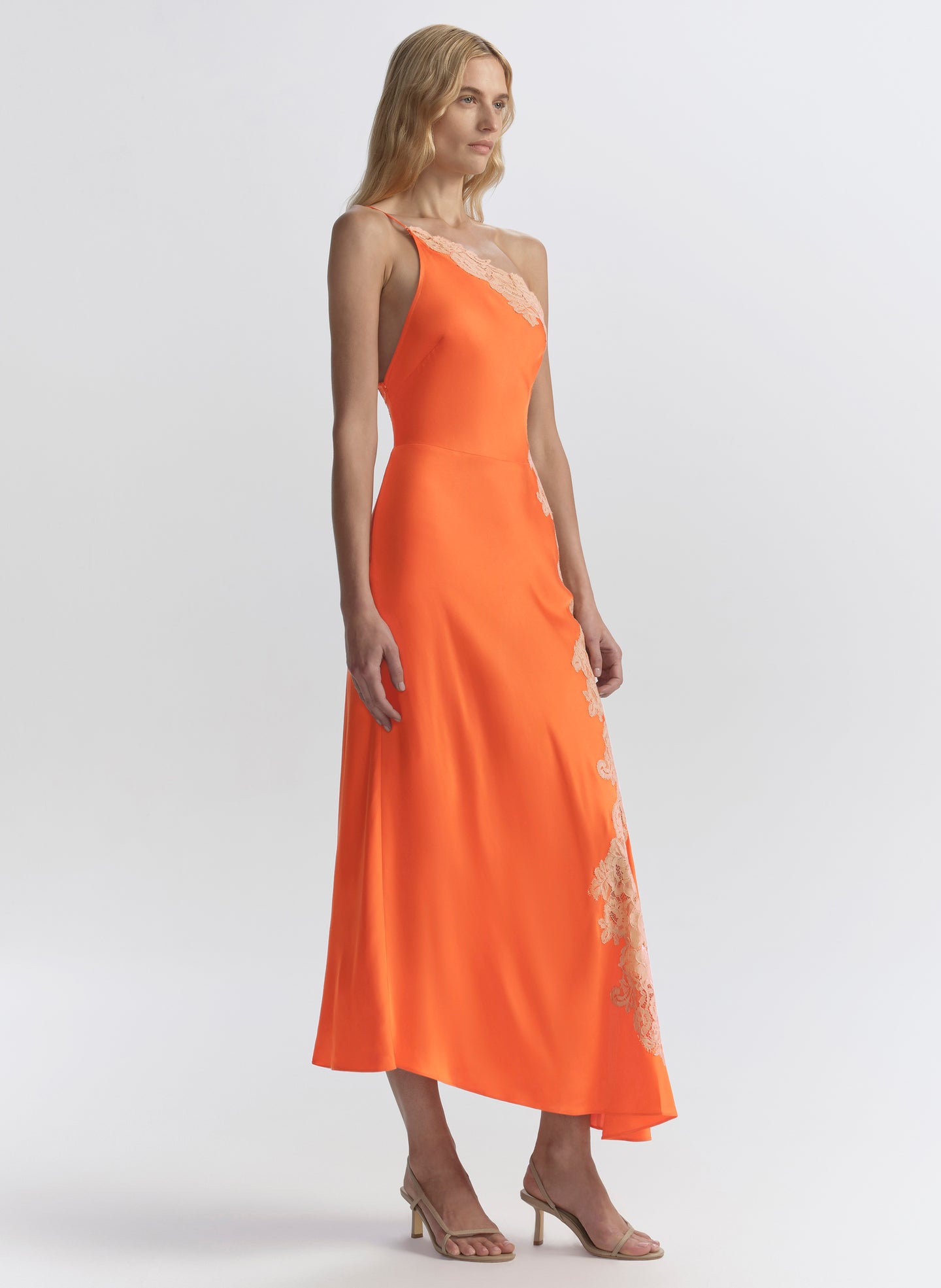woman in orange midi dress