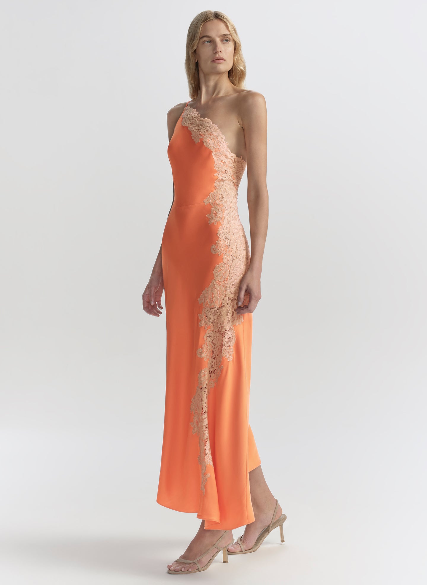 woman wearing orange midi dress