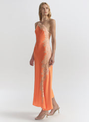 woman wearing orange midi dress