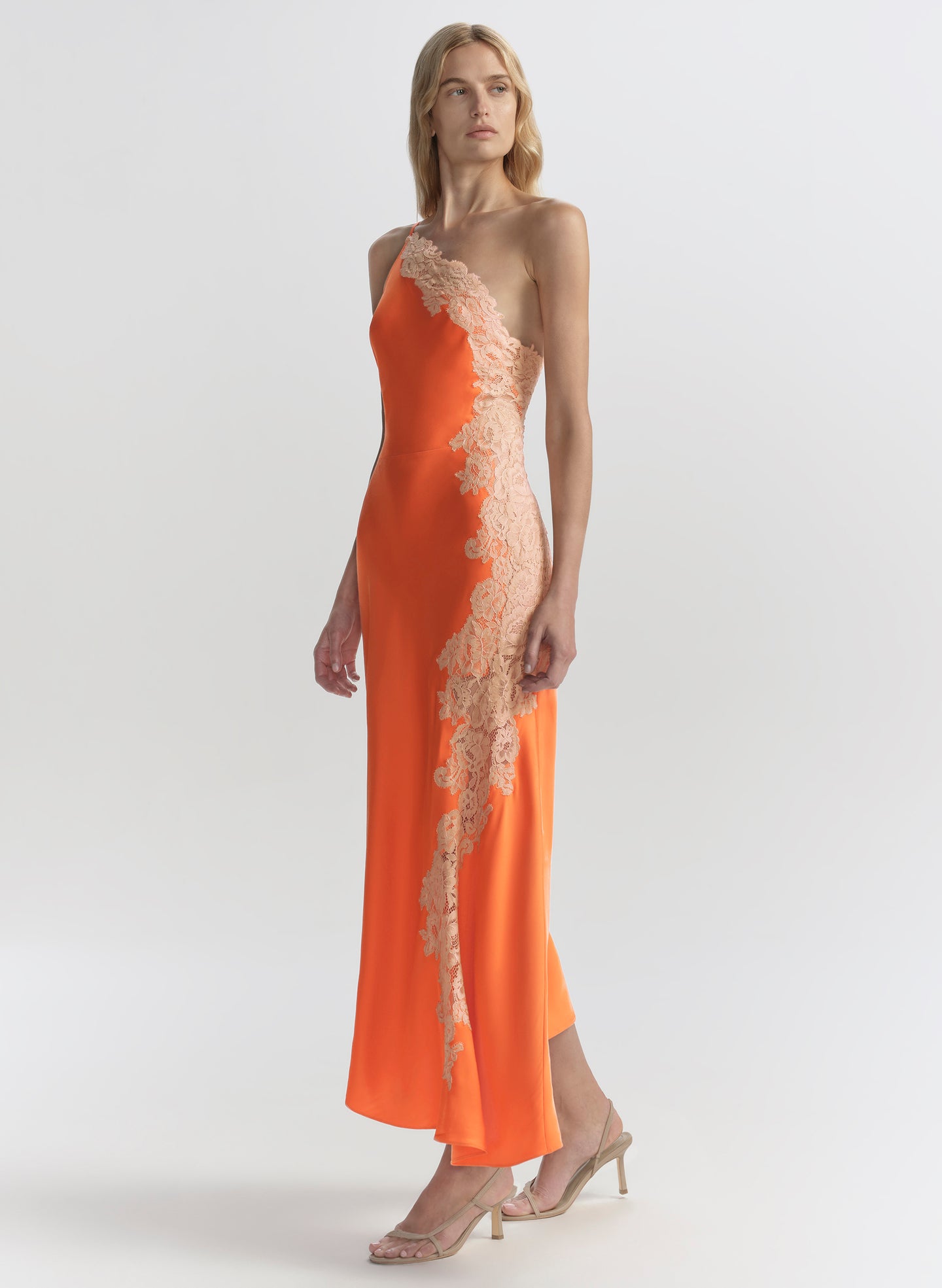 woman in orange midi dress with lace