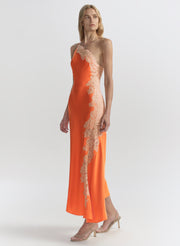 woman in orange midi dress with lace