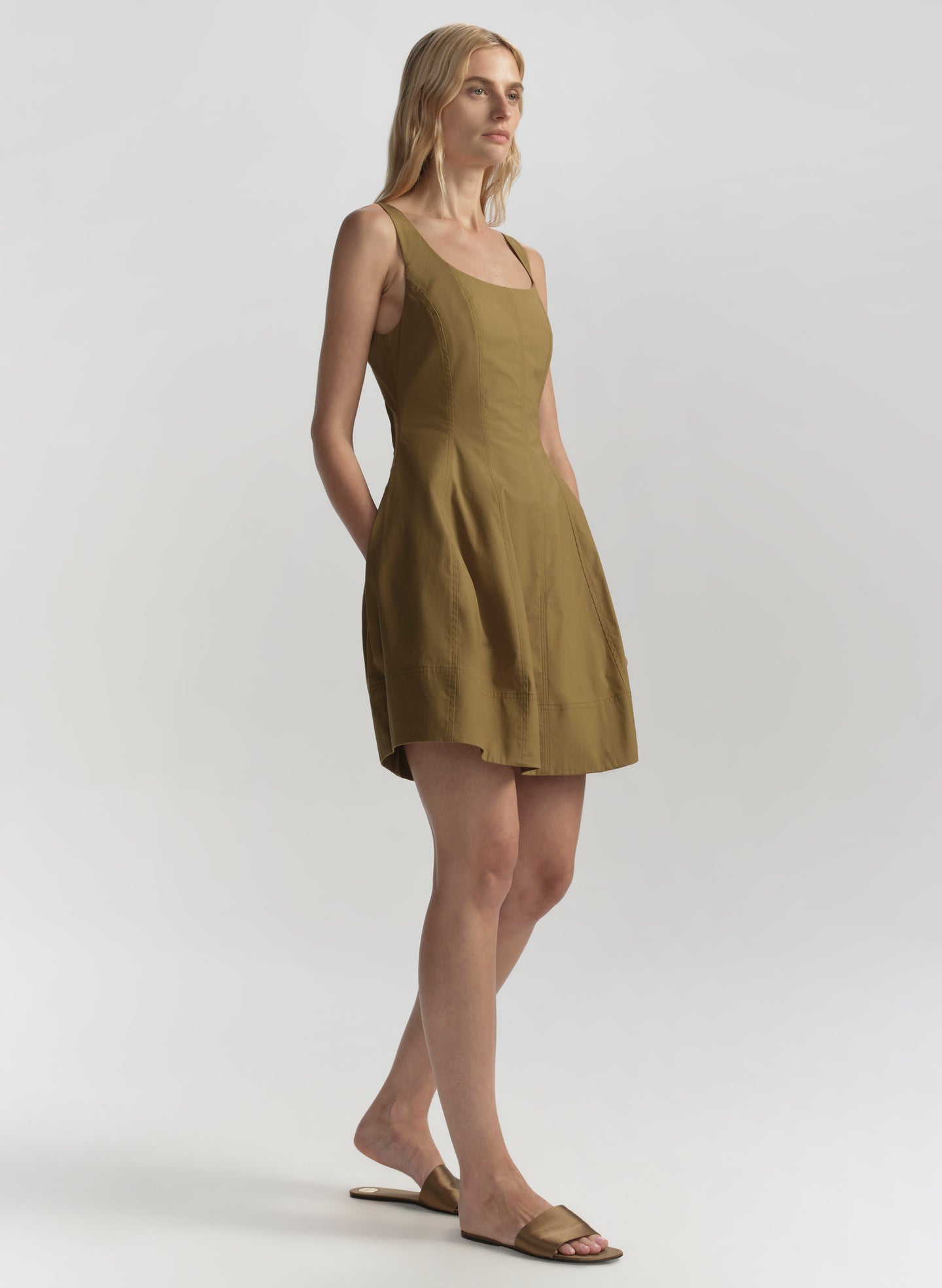 woman wearing brown mini dress