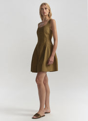 woman wearing brown dress