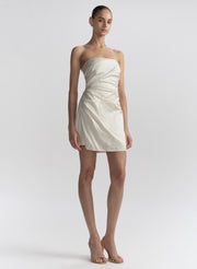 woman wearing white strapless mini dress