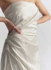 woman wearing white strapless mini dress