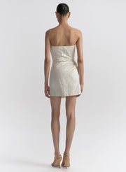 woman wearing white strapless mini dress