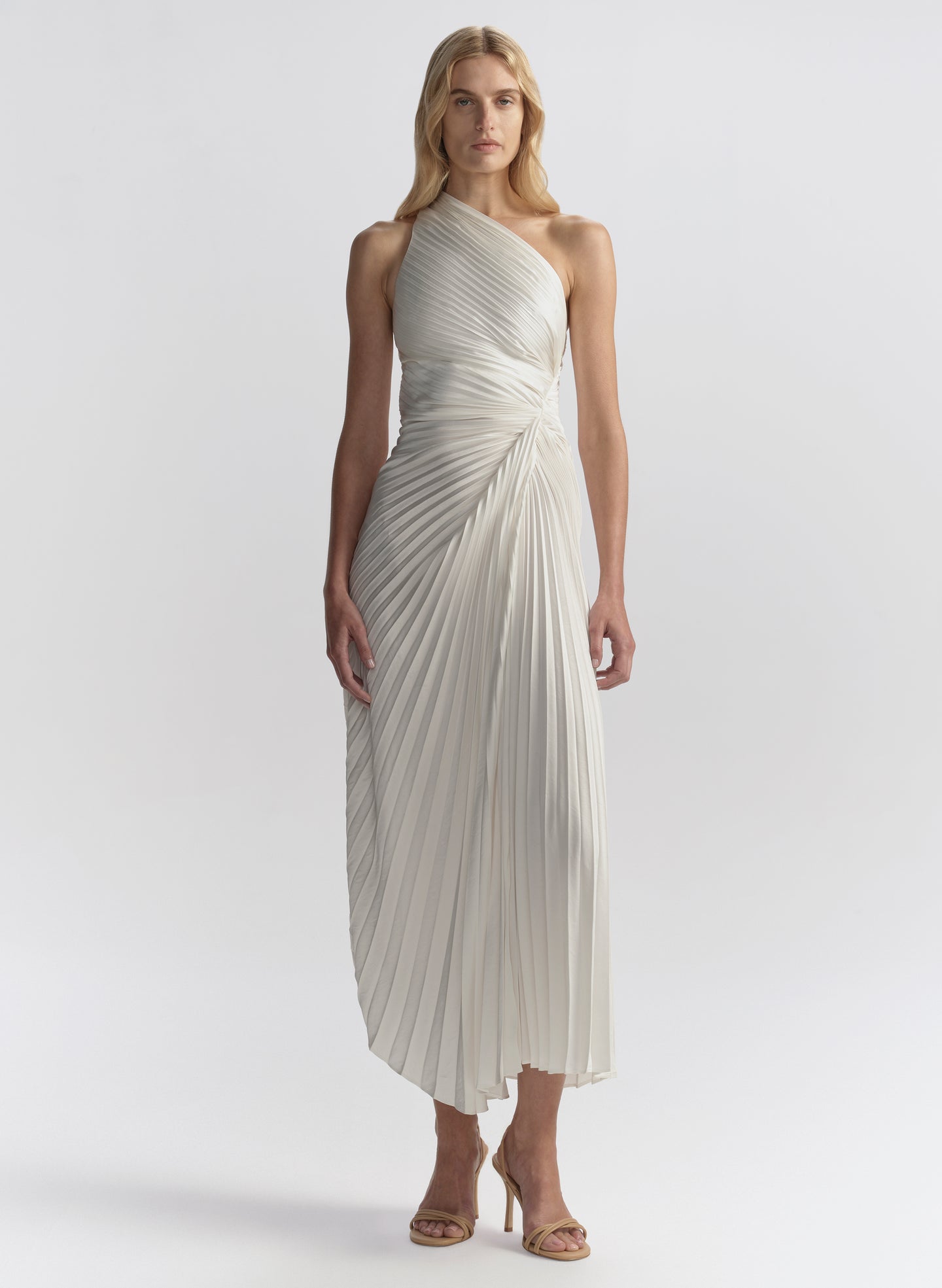 woman wearing white pleated midi dress