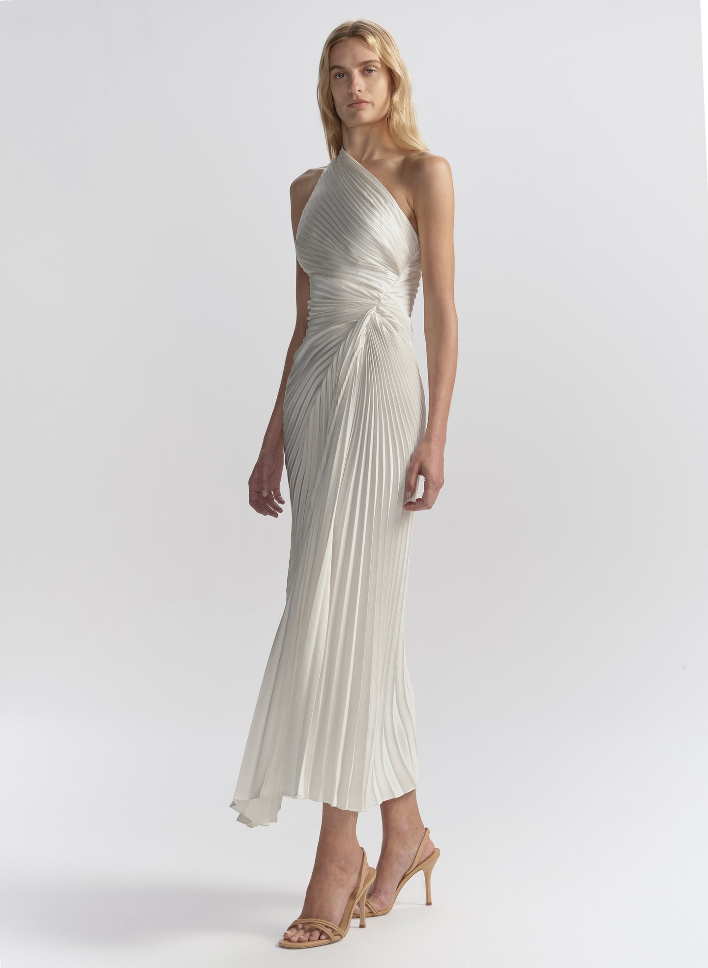 woman wearing white pleated midi dress