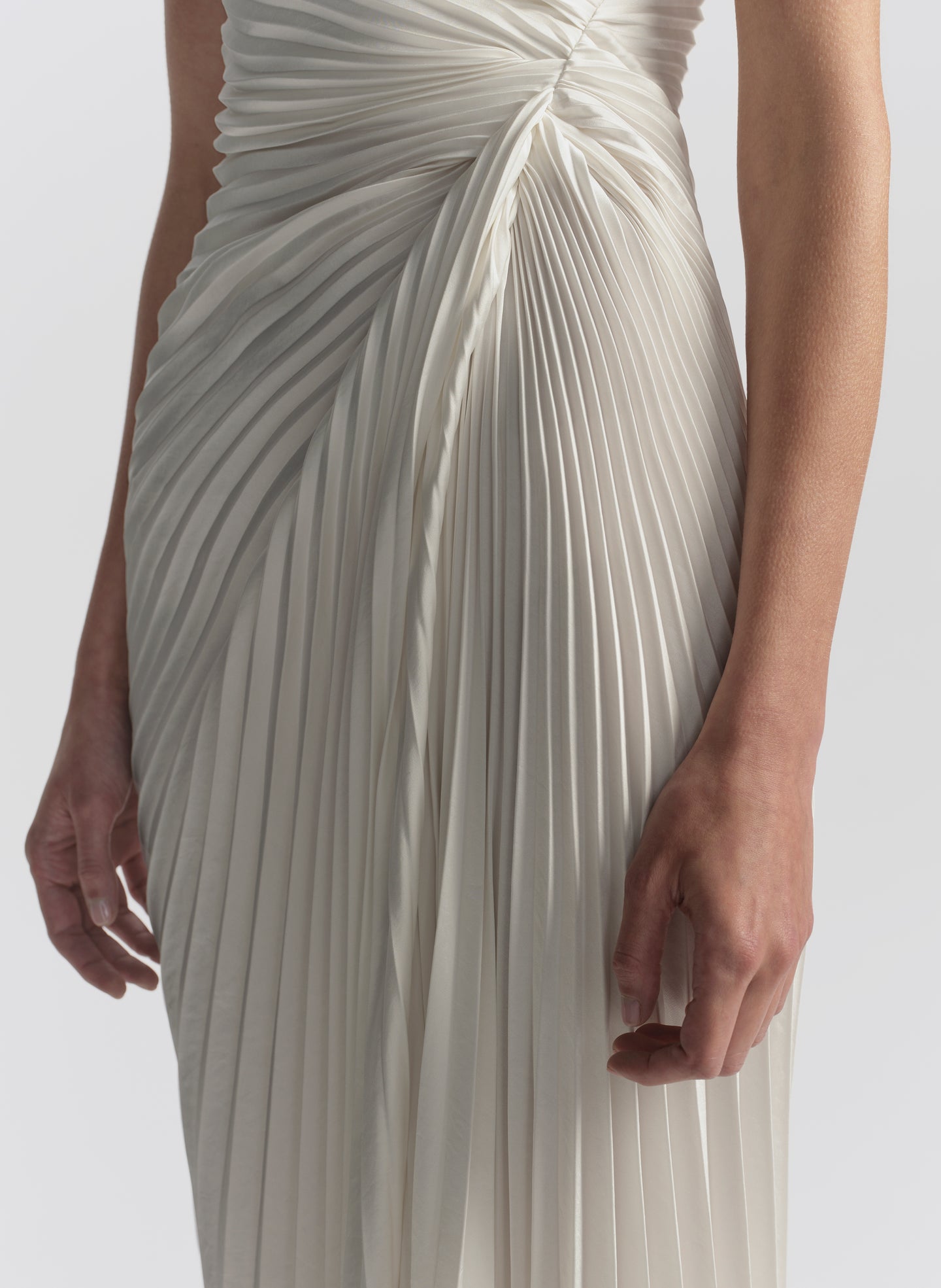 woman wearing white pleated midi dress