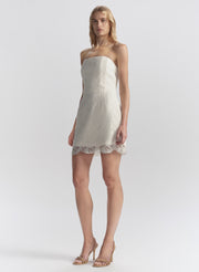 woman wearing white lace mini dress