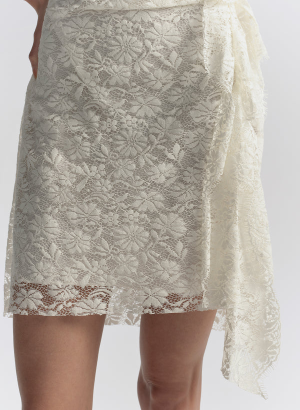woman wearing white lace mini dress
