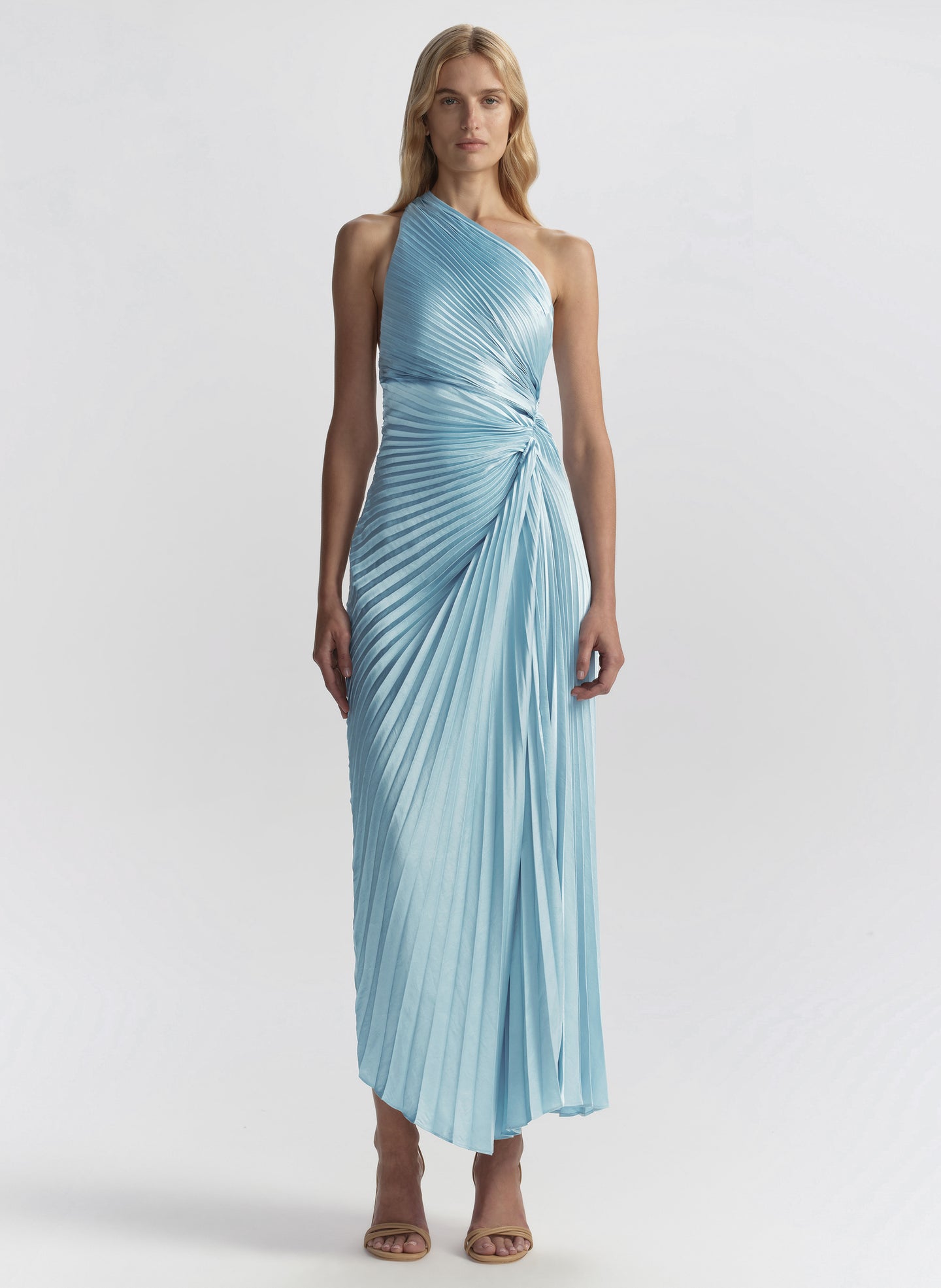 woman wearing light blue pleated dress