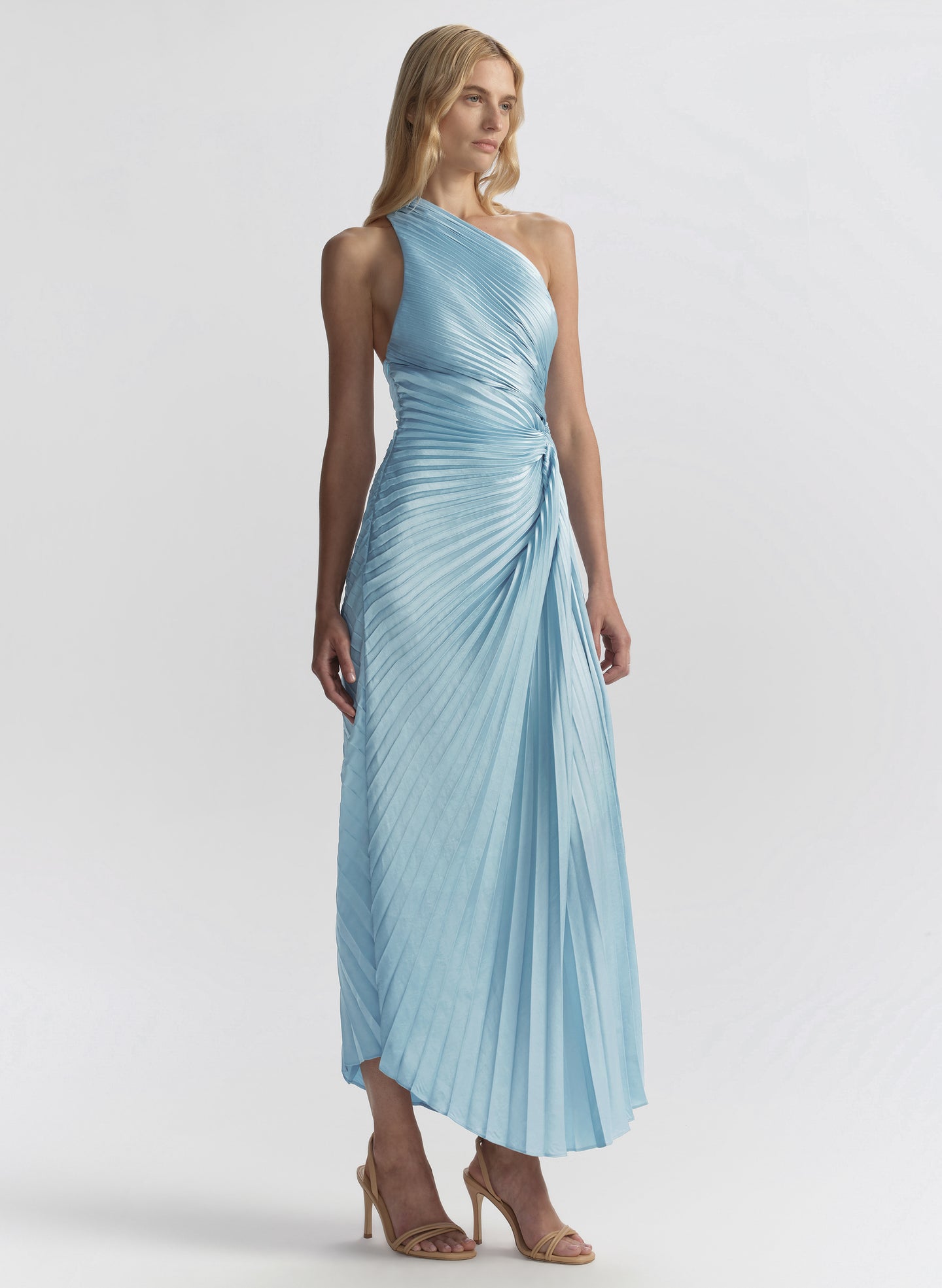 woman wearing light blue pleated dress