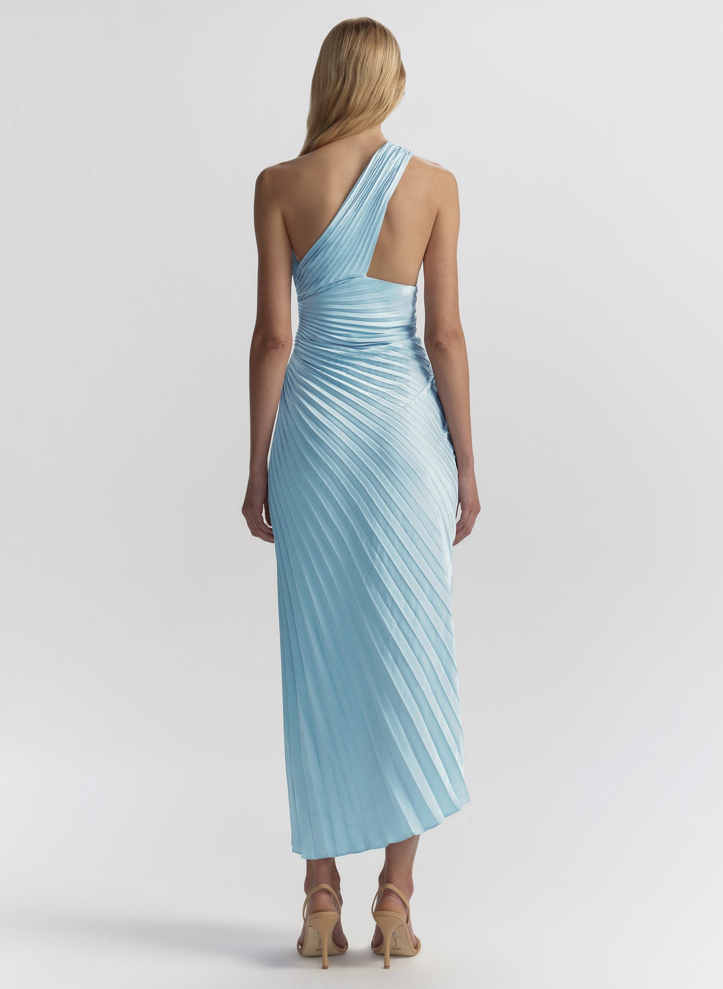 woman wearing light blue pleated dress