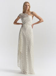 woman wearing white lace maxi dress