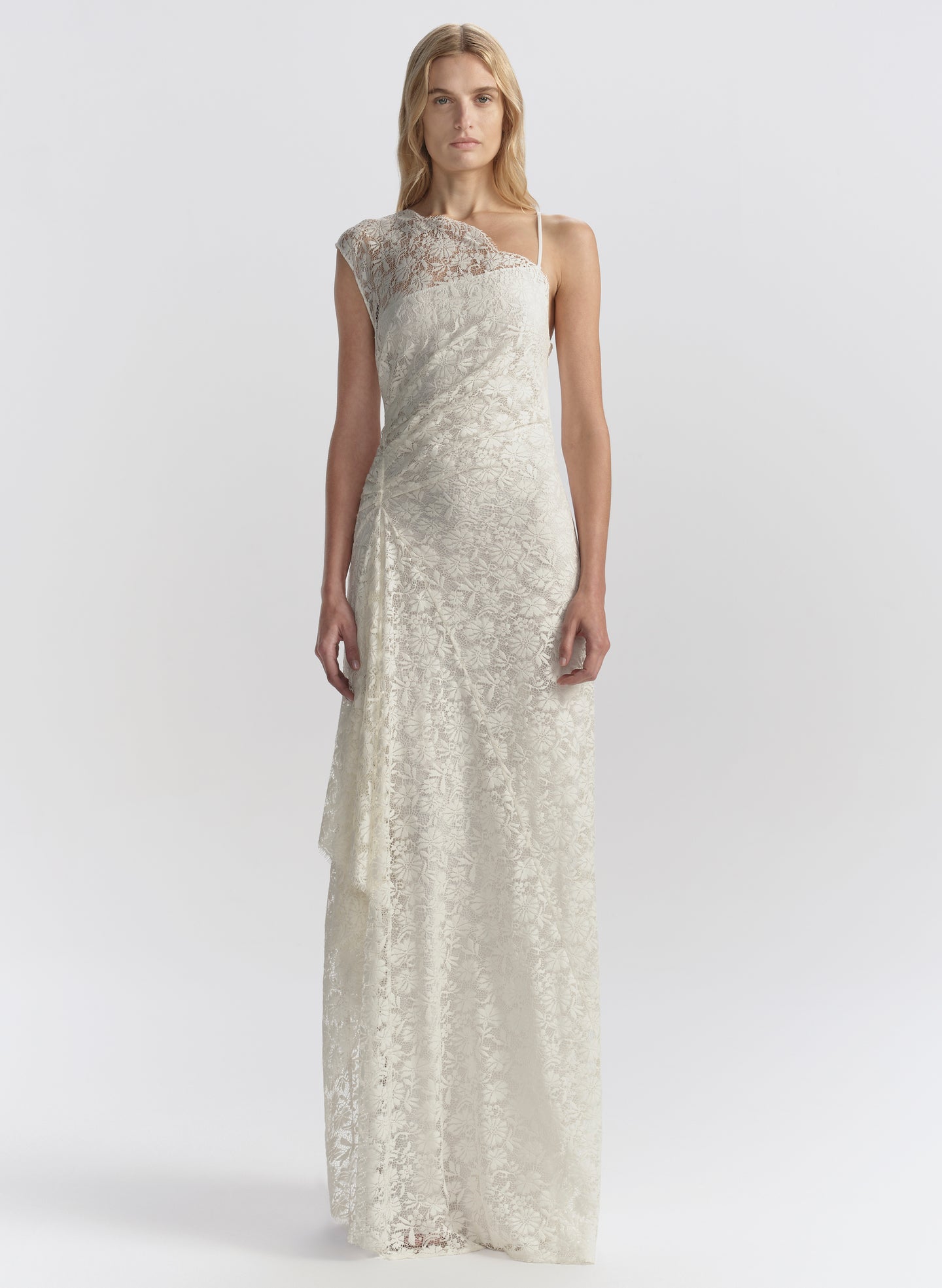 woman wearing white lace maxi dress