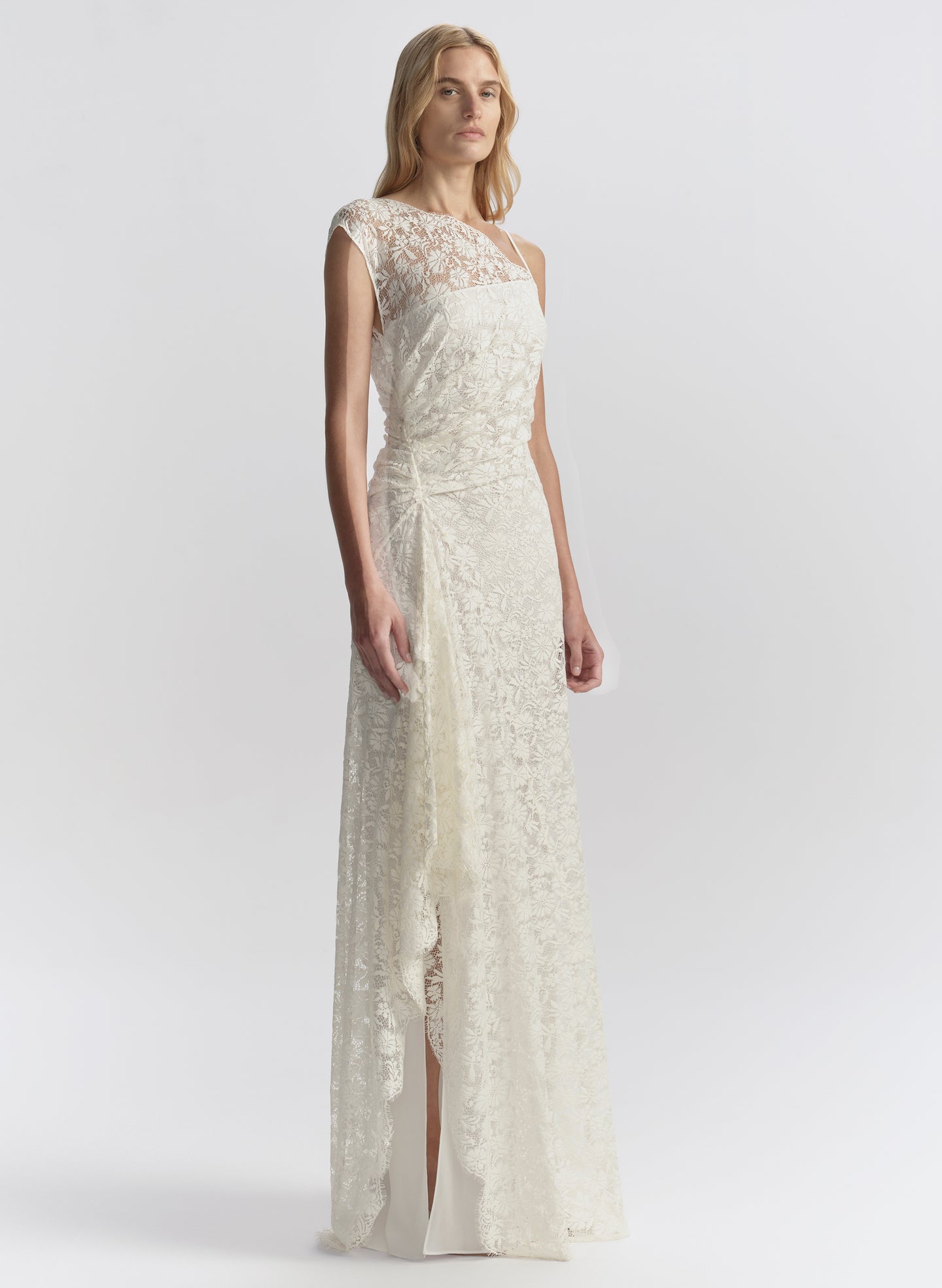 woman wearing white lace maxi dress