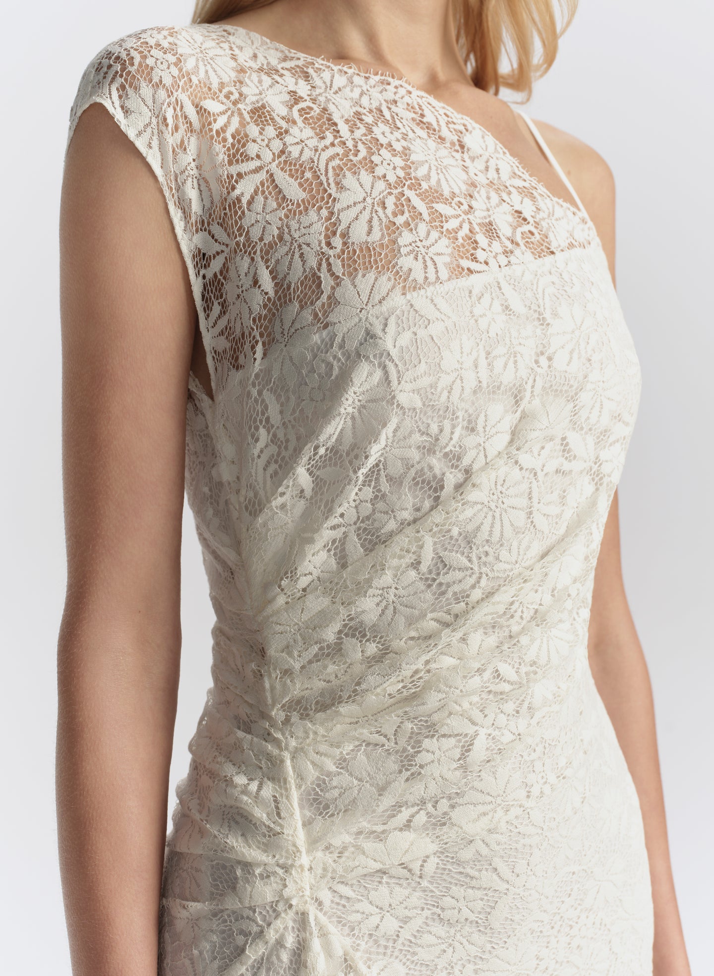 woman wearing white lace maxi dress