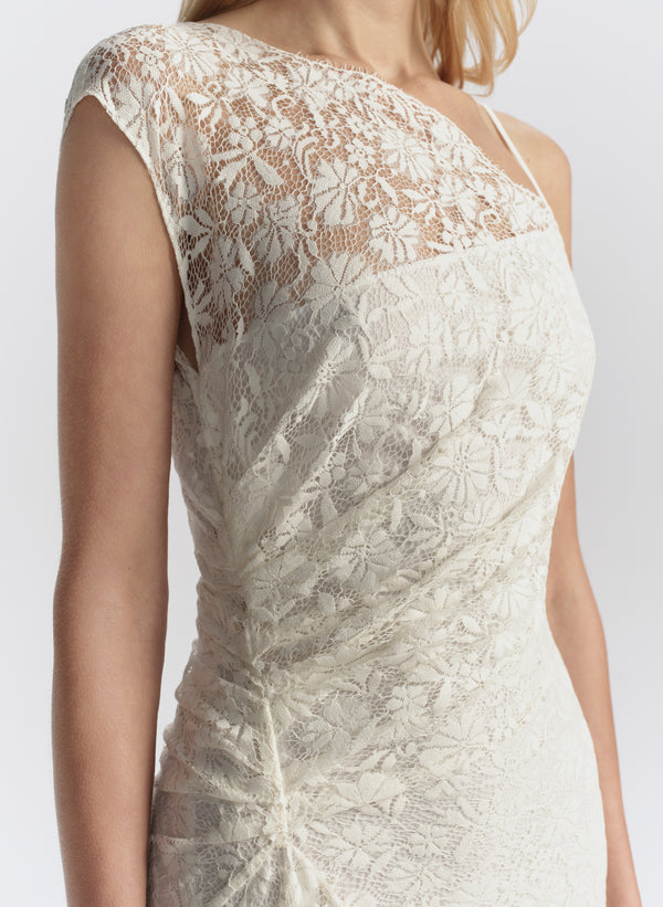 woman wearing white lace maxi dress