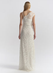 woman wearing white lace maxi dress