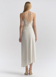 woman wearing white one shoulder lace trim midi dress