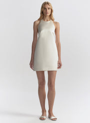 woman wearing white mini dress