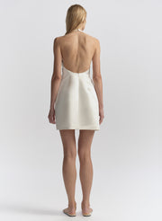 woman wearing white mini dress