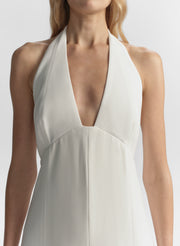 woman wearing white halter jumpsuit