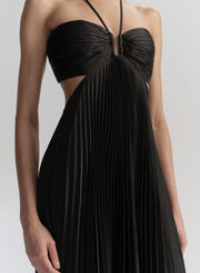 Woman wearing a black evening gown on a white background