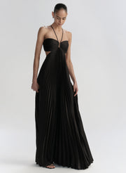 Woman wearing a black evening gown on a white background