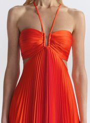 Orange halter neck dress on a white background