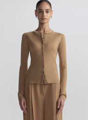 woman wearing tan cardigan and tan pants