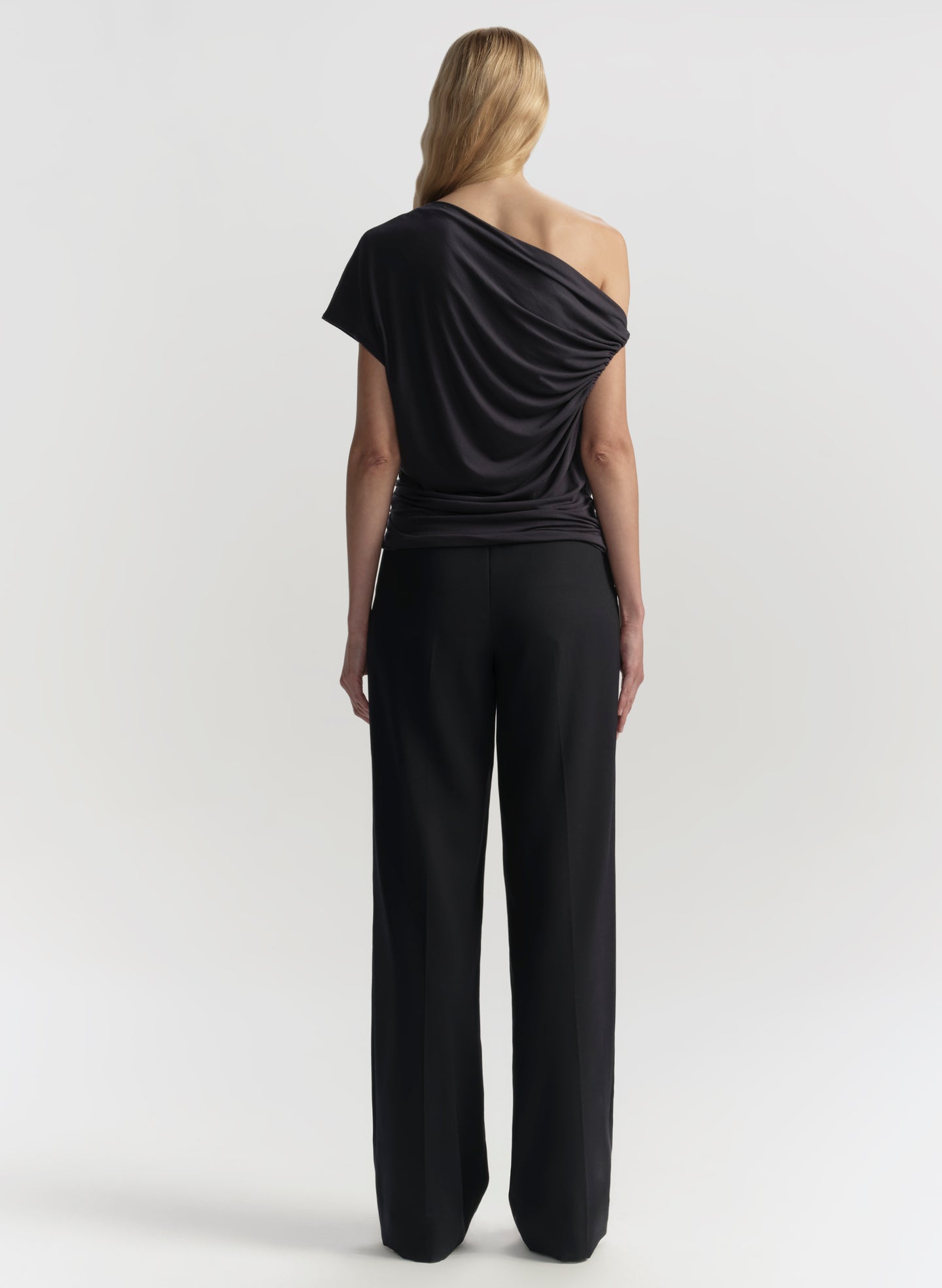 woman wearing blue top and pants