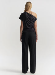 woman wearing blue top and pants