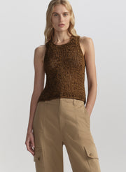 woman wearing brown tank top and tan cargo pants